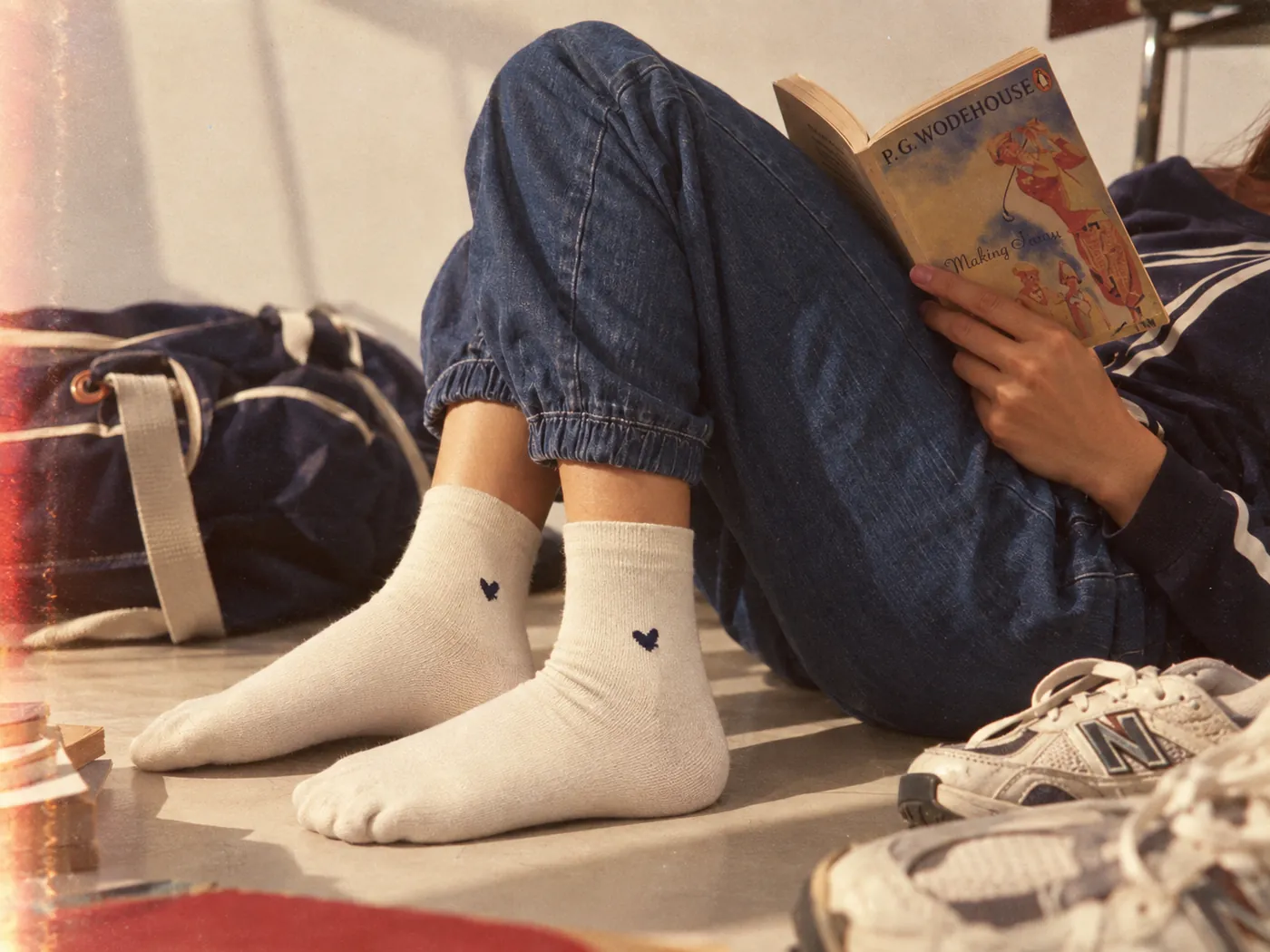 Cream socks worn while reading on the floor