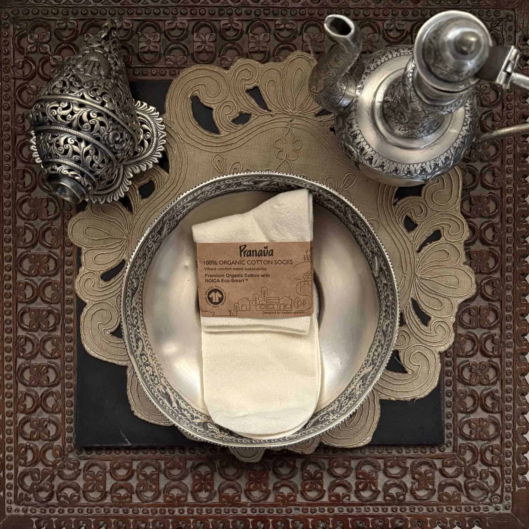 Vesper Oat in its card wrap on a silver tray